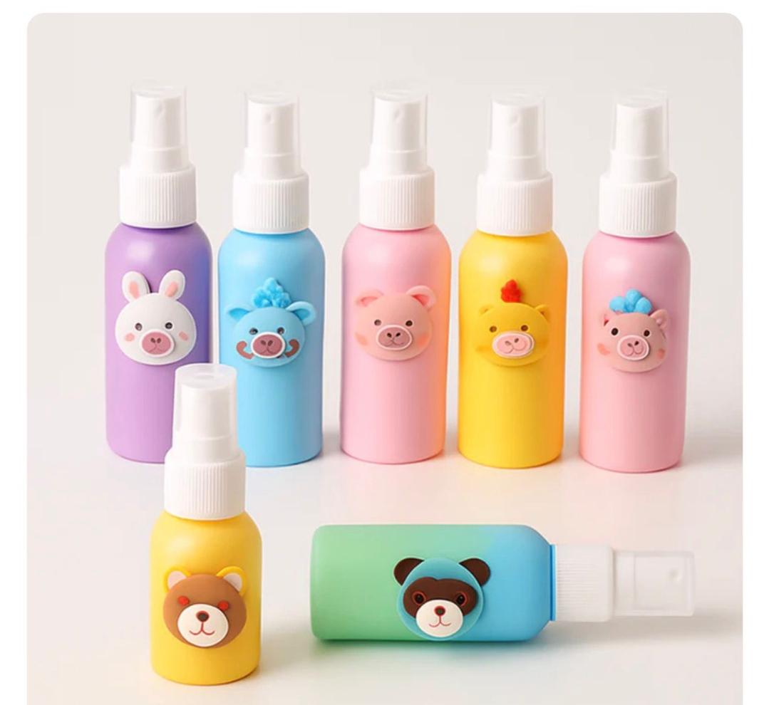 Refillable spray bottle